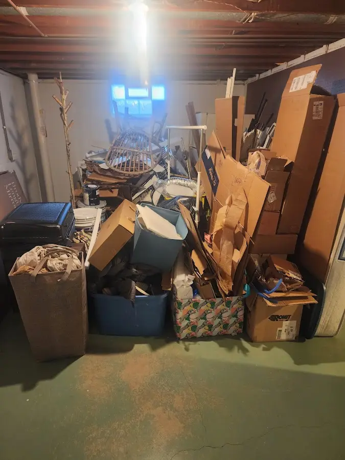 Roll-off dumpster container at job site for Construction Dumpster Rental in Putney